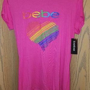 New Women's BeBe shirt with rainbow heart on front. Comfortable !